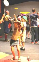 Spinning plates in circus workshop