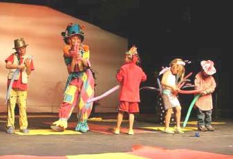 Julia Gayle's balloon act with children for theater show